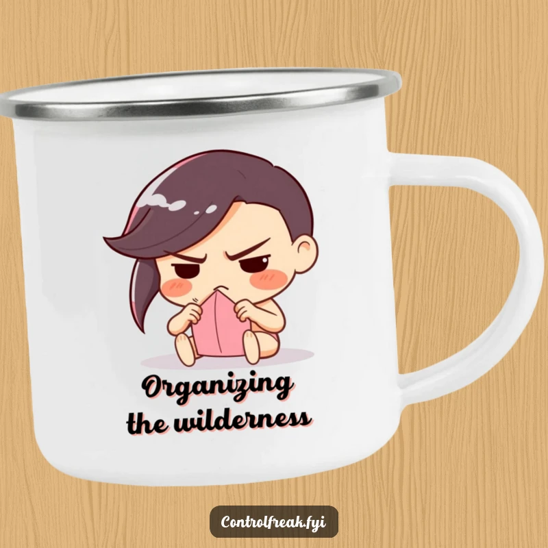 Funny camping mug with a character with a determined frown, meticulously folding paper, designed for outdoor crafters who appreciate precision.