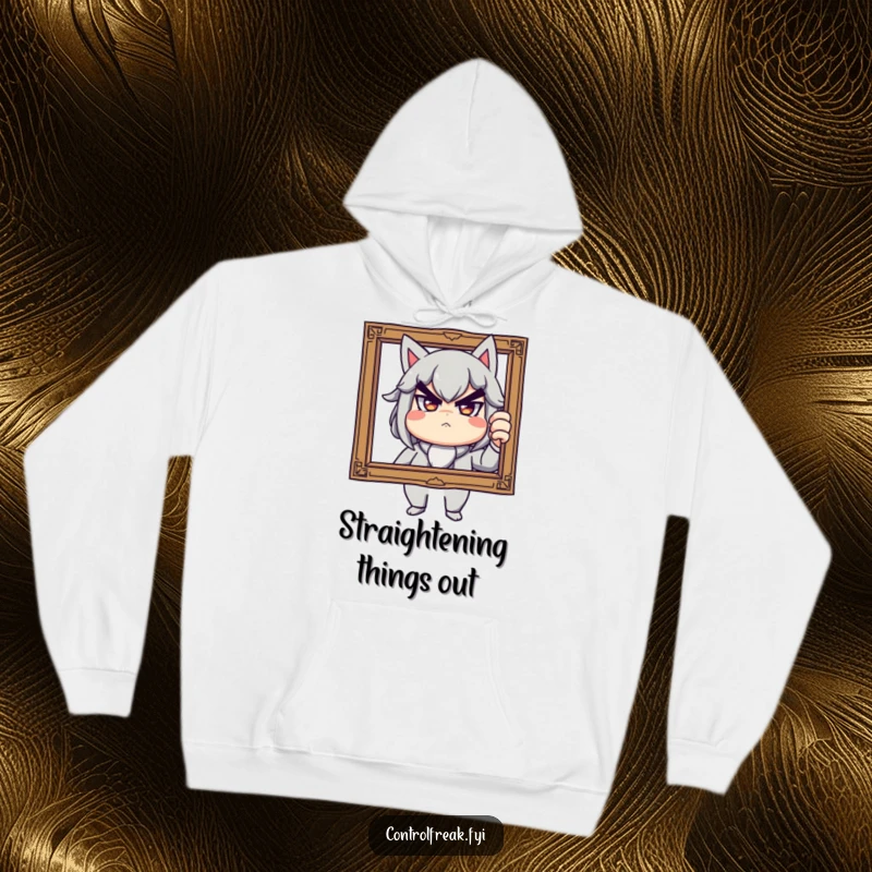 Funny hoodie with a stern but playful character adjusting a tilted picture frame, offering warm humor and a quirky style, a great gift.