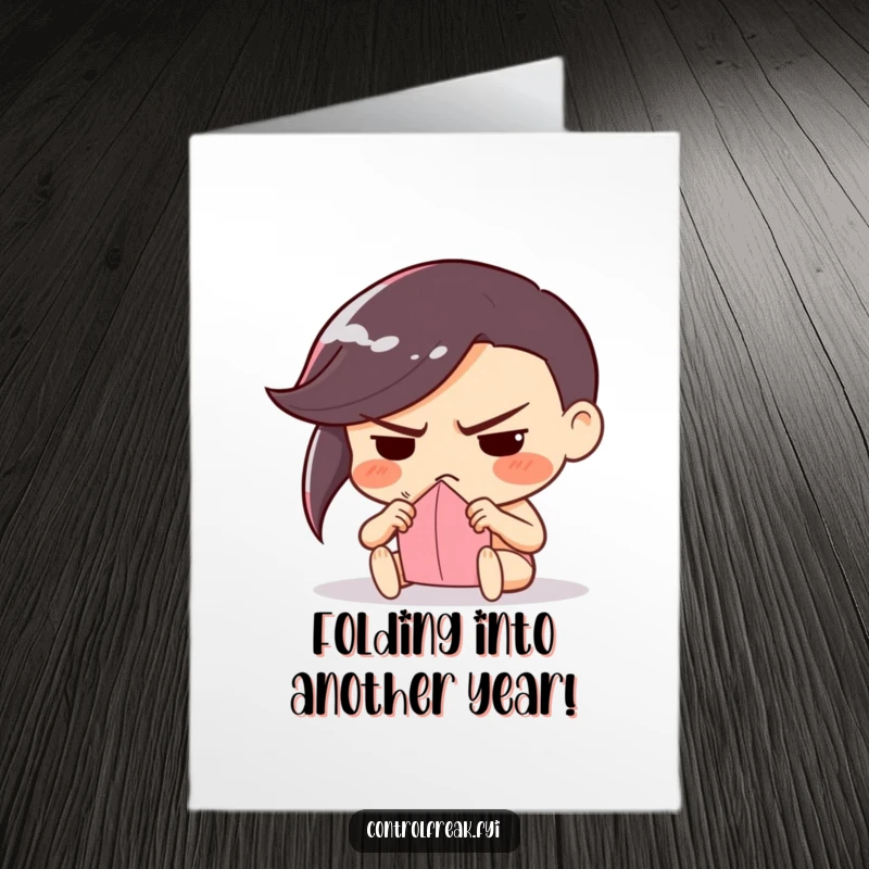 Funny Free Printable Birthday Card: A character frowning determinedly while meticulously folding a single piece of paper.