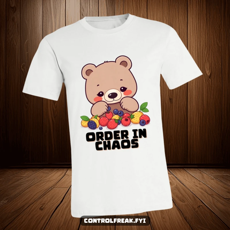 Funny bear t-shirt depicting a focused bear arranging berries into a precise geometric pattern, ideal for organized minds.